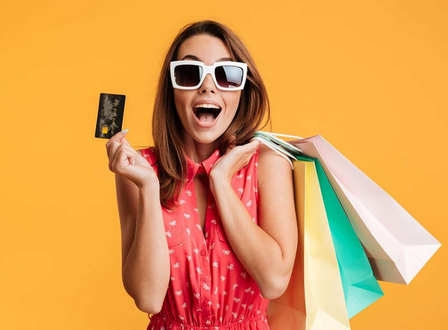 A woman shopping with the best cards to buy online